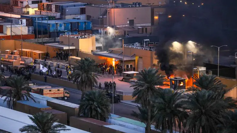 Protesters set fire to entry control point at the US Embassy in Baghdad