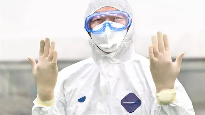 Coronavirus: CDC Expert in a Hazmat Suit