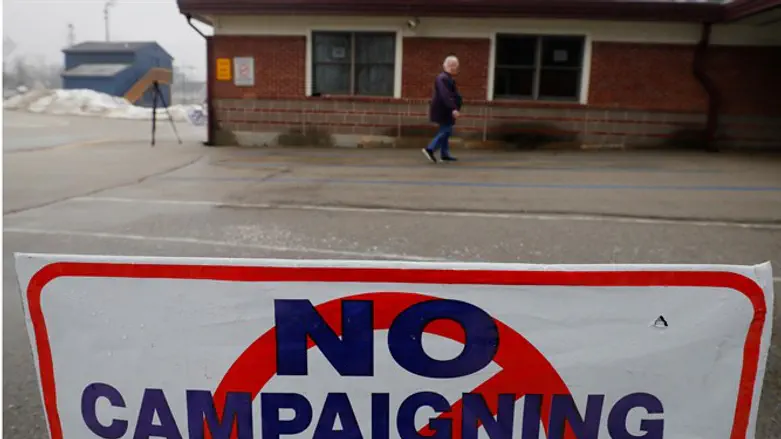 Voter arrives at polling site in New Hampshire primary