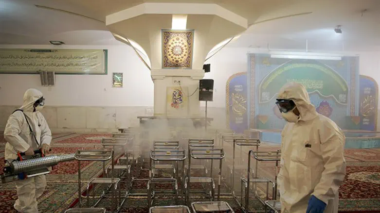 Disinfecting a mosque in Iran from coronavirus