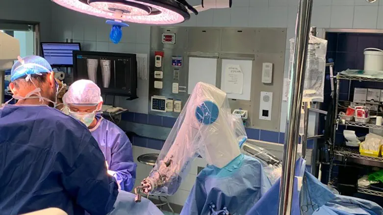 Surgeons doing knee surgery at Hadassah's Mount Scopus campus use the ROSA robot