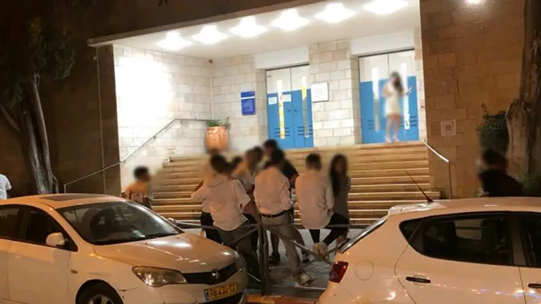Students outside the Hebrew Gymnasium on Sunday night