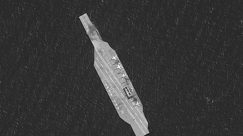 Iranian mockup aircraft carrier over Strait of Hormuz